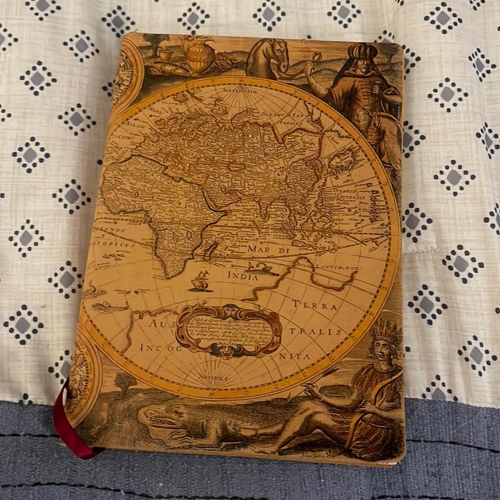Gently used World themed journal — several hundred pages